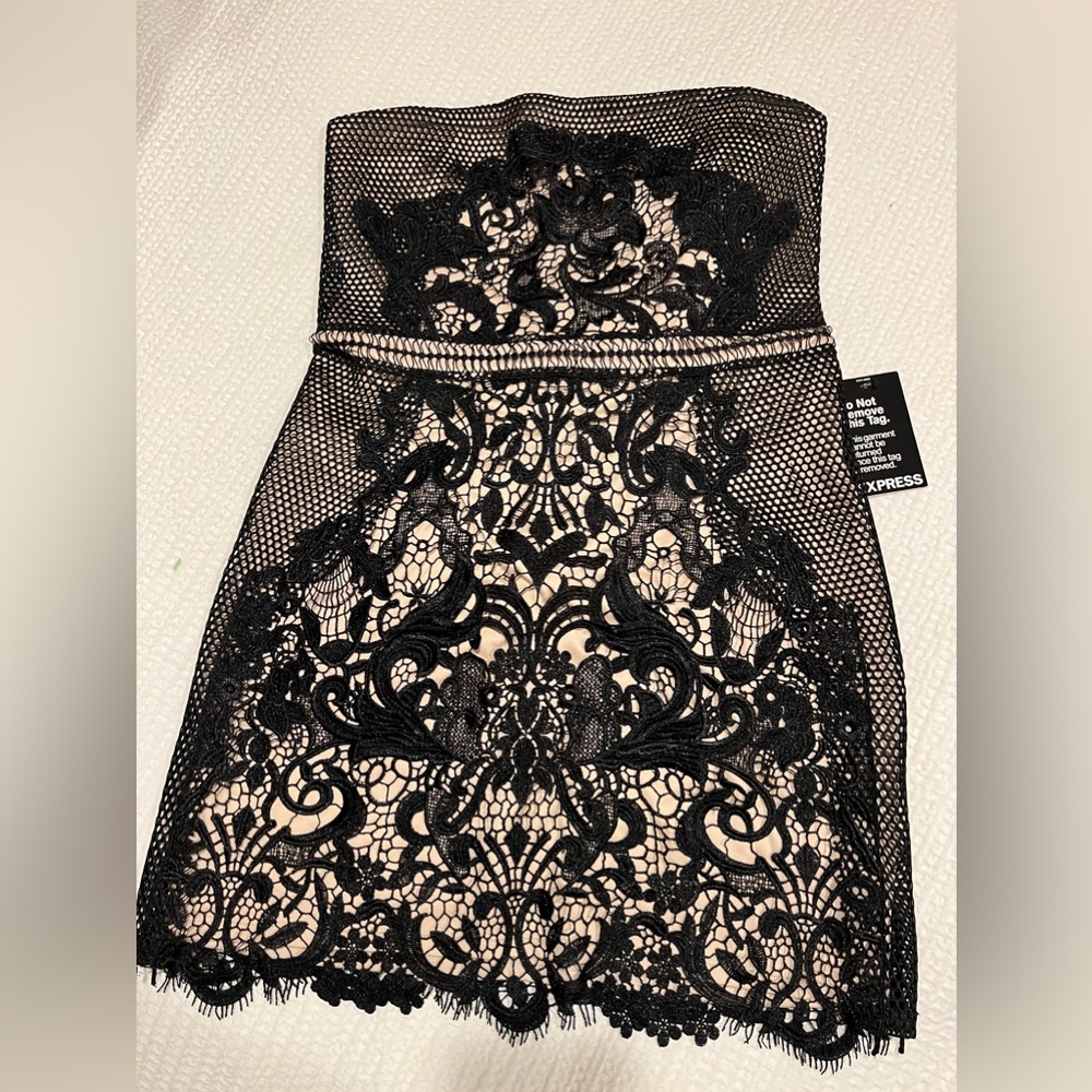 Straples Dress Thick Black lace/ Nude lining under.